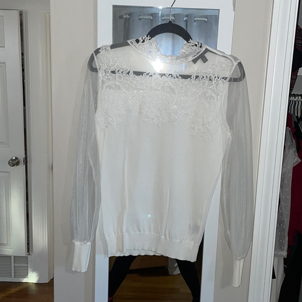 White shear sleeved blouse